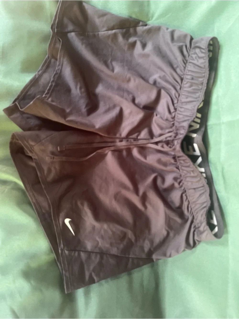Nike Women's Athletic Shorts in Dark Brown with White Swoosh